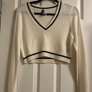 Cropped long sleeve sweater